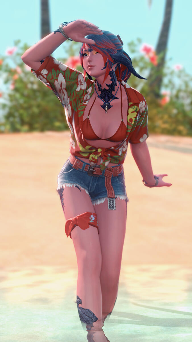 khali in her beach outfit at costa del sol, standing in the shallow water, and using a hand to shield her eyes from the sun.